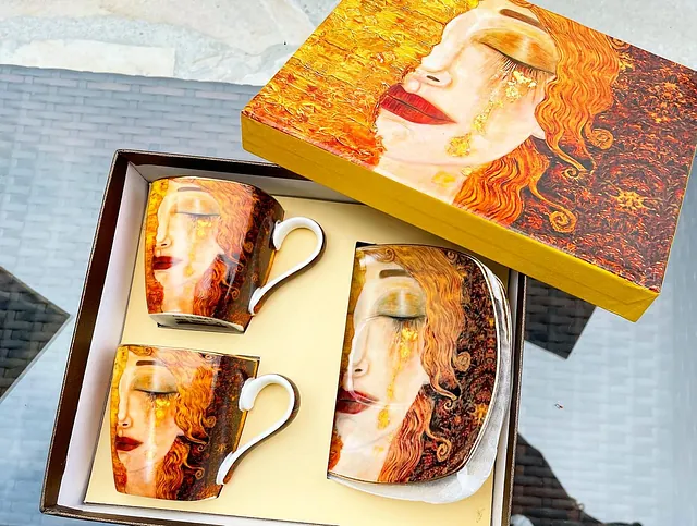 2 tasses à café et coupelles 